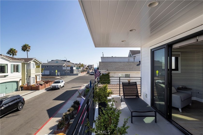 Just one block from the sand, this custom-built Newport Beach - photo 18