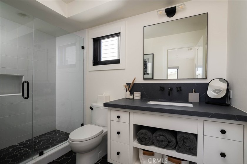Just one block from the sand, this custom-built Newport Beach - photo 21