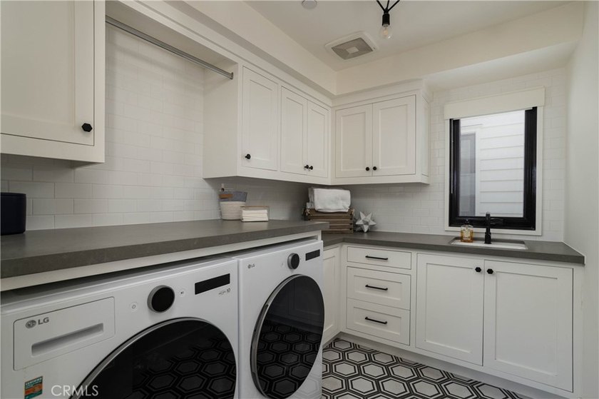 Just one block from the sand, this custom-built Newport Beach - photo 26