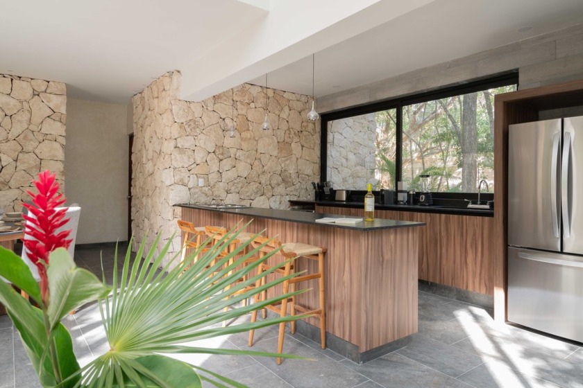 Villa 2 is a remarkable 4-bedroom, 4-bathroom residence nestled - photo 11