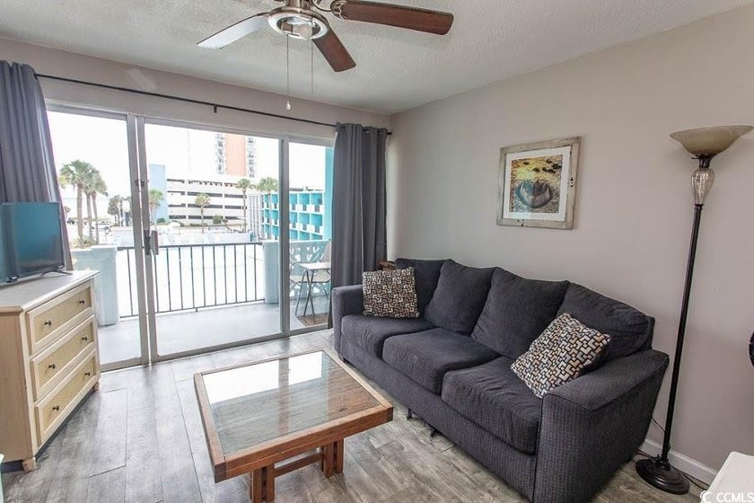 Step into beachside living with this charming one-bedroom condo - photo 15