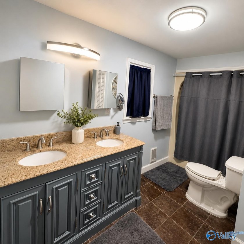 Rare opportunity on Weiss Lake! This beautifully updated 4BR/3BA - photo 8
