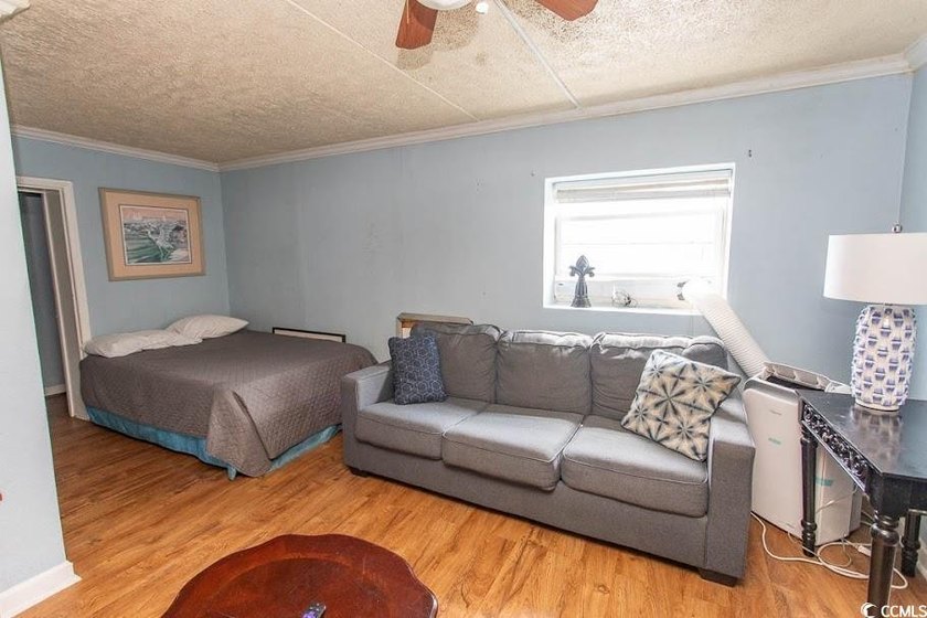 Step into beachside living with this charming one-bedroom condo - photo 12
