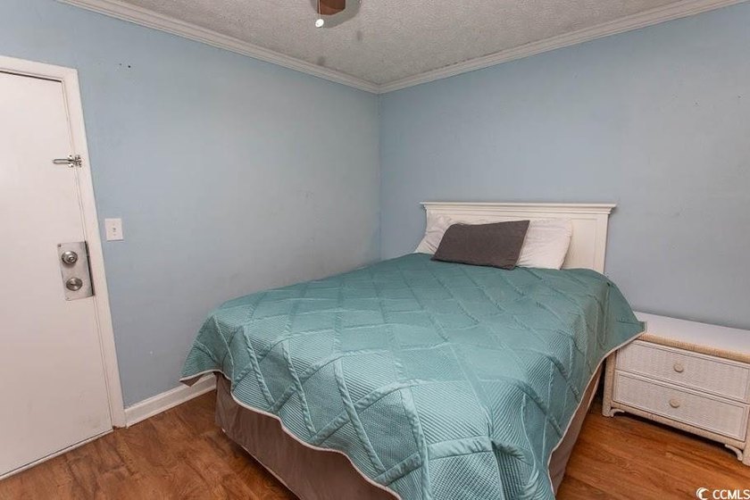 Step into beachside living with this charming one-bedroom condo - photo 15