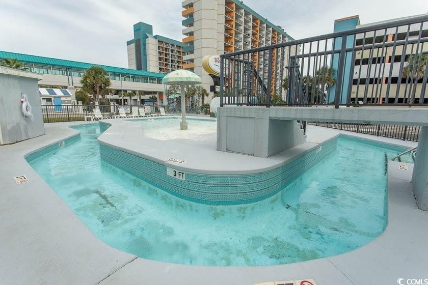 Step into beachside living with this charming one-bedroom condo - photo 22