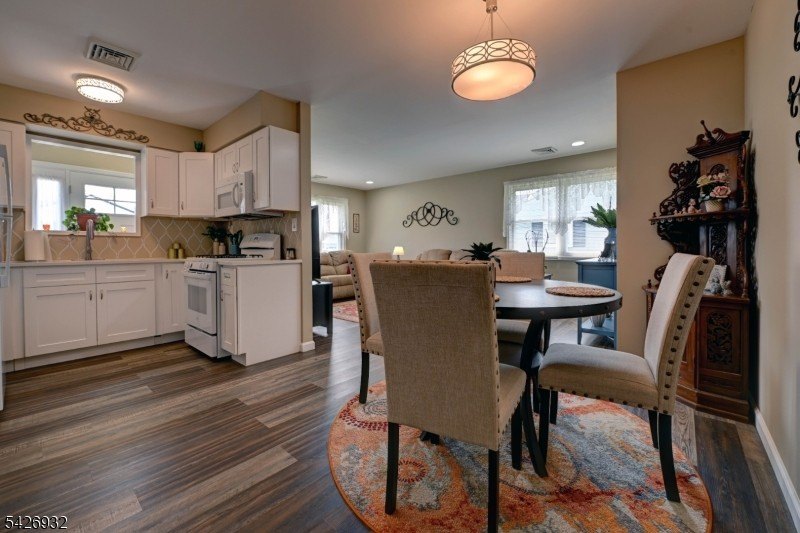 Step into easy living at 123 Columbine Circle, a beautifully - photo 4