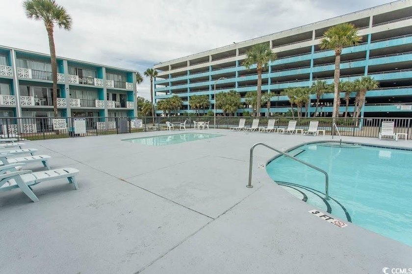 Step into beachside living with this charming one-bedroom condo - photo 26