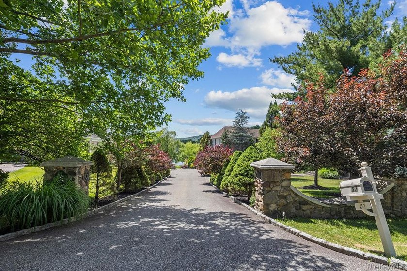 A Private Estate with Breathtaking Pond Views Tucked away at the - photo 3