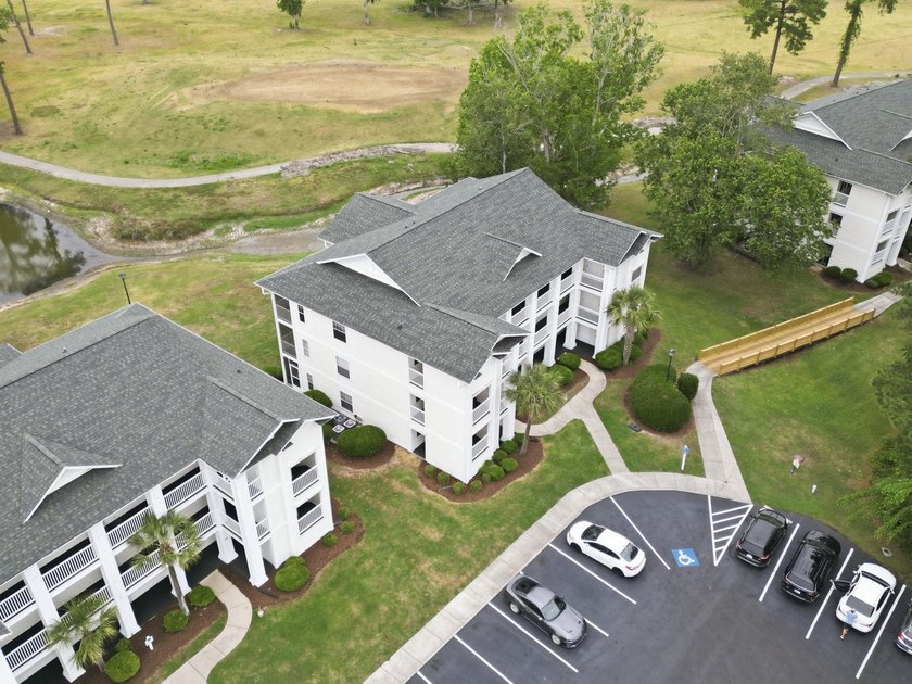 End-unit, top-floor two-bedroom, two-bathroom condo with a split - photo 46