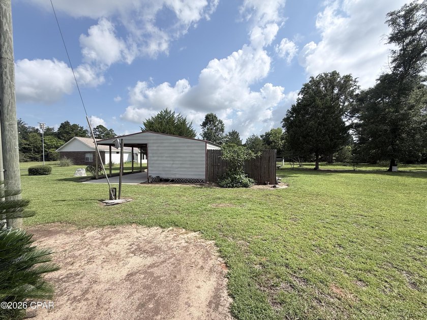 Welcome home to this spacious 3-bedroom, 2-bath brick home - photo 33