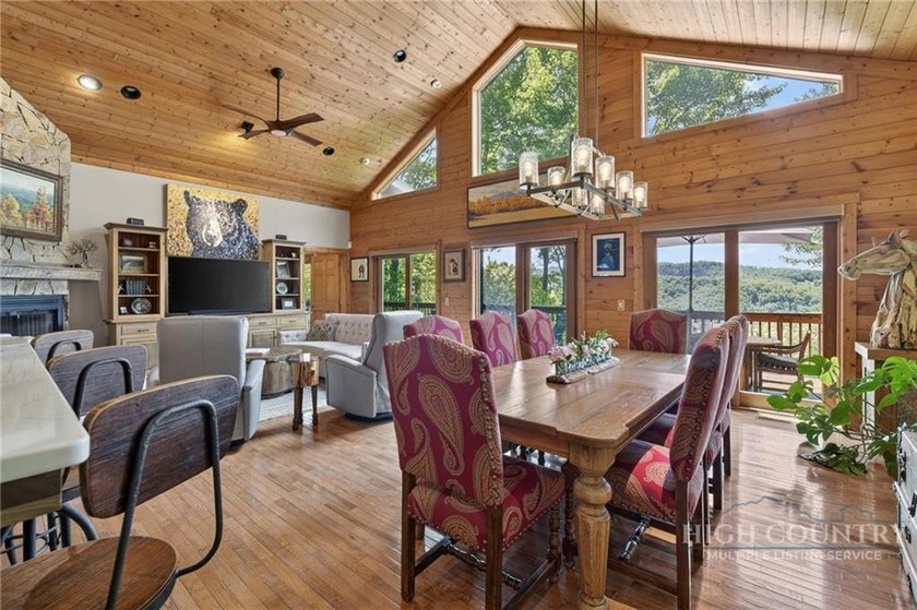 Magnificent home embraced by rhododendrons and hardwood trees - photo 14