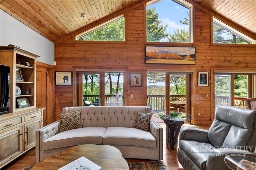 Magnificent home embraced by rhododendrons and hardwood trees - photo 15