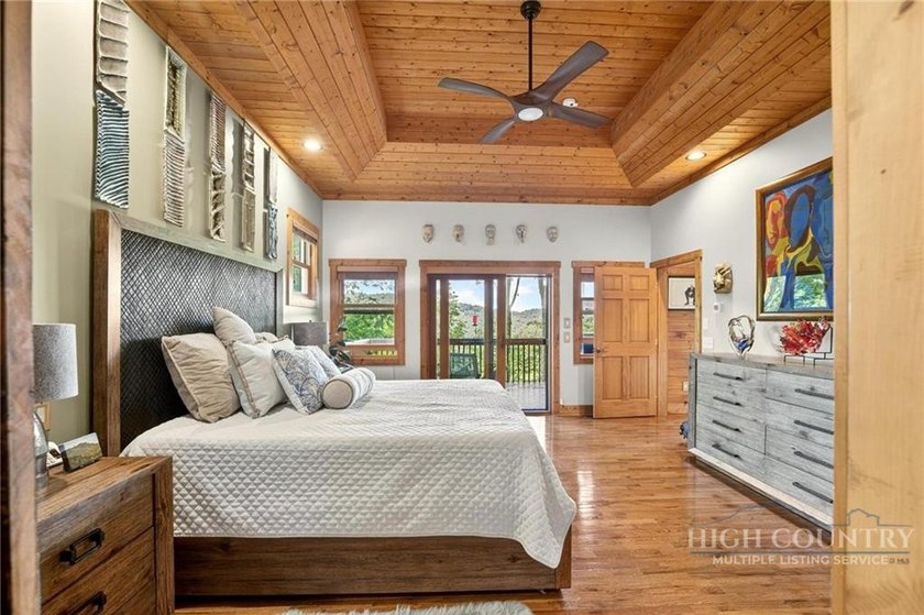 Magnificent home embraced by rhododendrons and hardwood trees - photo 24