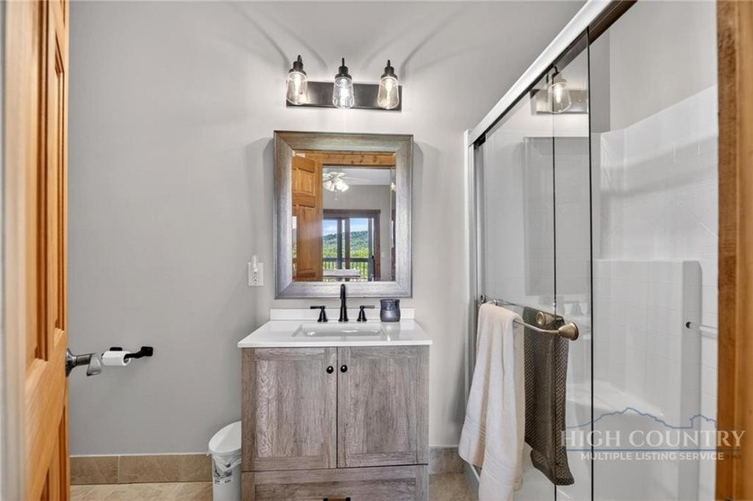 Magnificent home embraced by rhododendrons and hardwood trees - photo 28