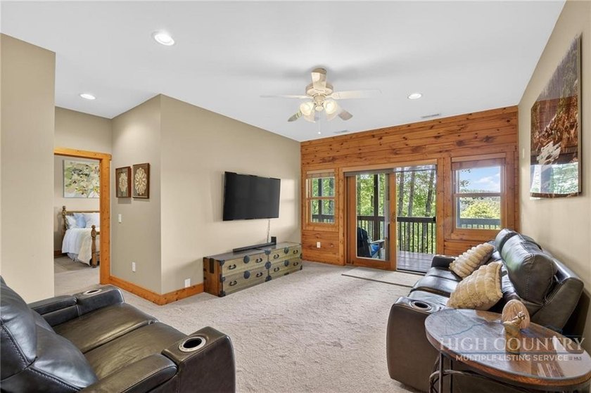 Magnificent home embraced by rhododendrons and hardwood trees - photo 30