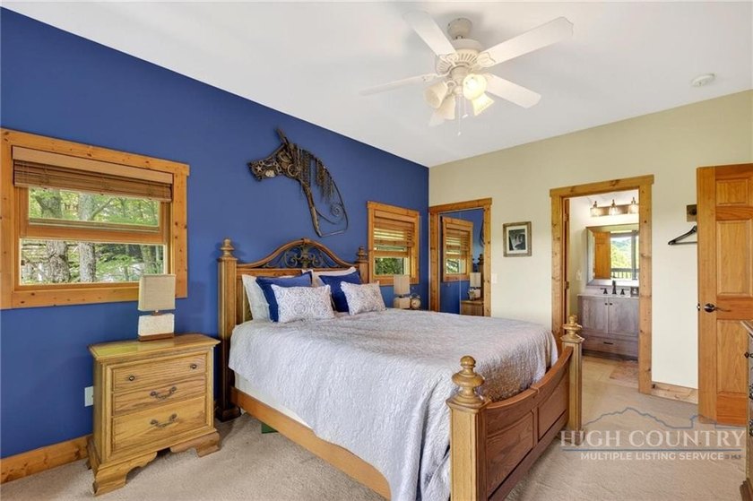 Magnificent home embraced by rhododendrons and hardwood trees - photo 31