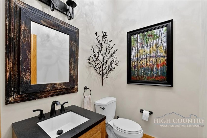 Magnificent home embraced by rhododendrons and hardwood trees - photo 33