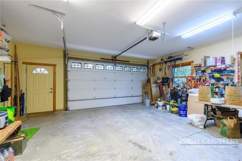 Magnificent home embraced by rhododendrons and hardwood trees - photo 37