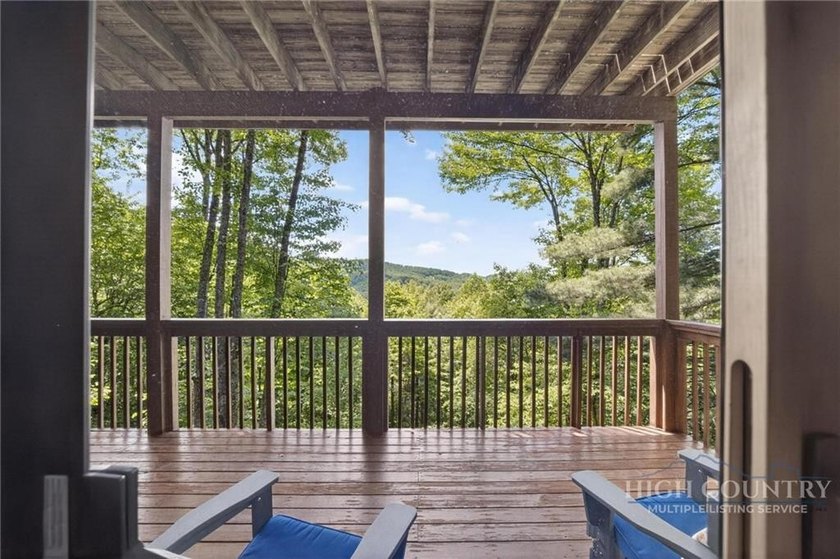 Magnificent home embraced by rhododendrons and hardwood trees - photo 38