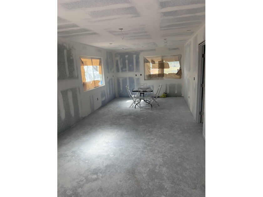 This home is approximately 75% complete. Drywall is mostly - photo 8