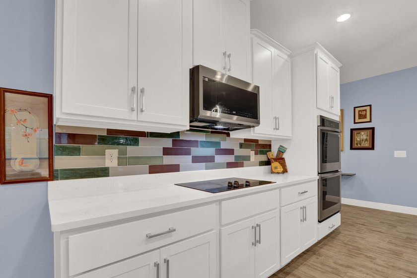 This stunning home features a bright, open-concept design - photo 13