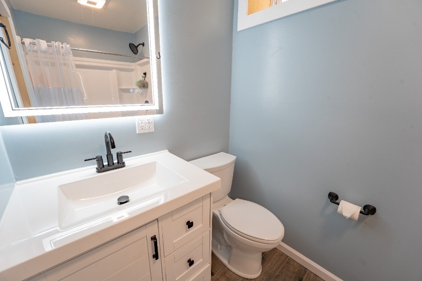Fully remodeled, modern lake home with 10' lake access - photo 24