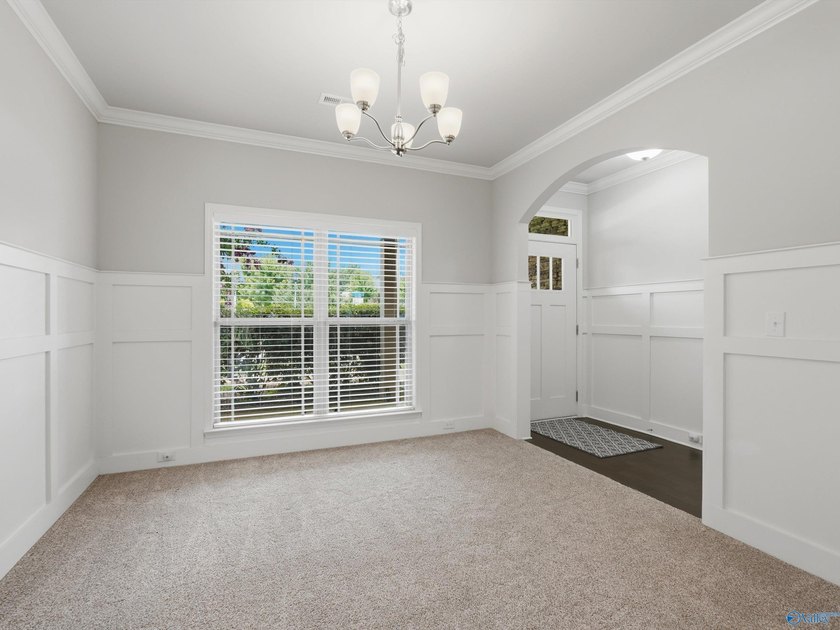 This home offers unbeatable convenience, just minutes from - photo 4