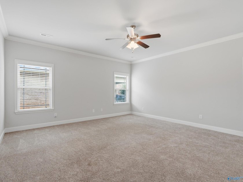 This home offers unbeatable convenience, just minutes from - photo 5