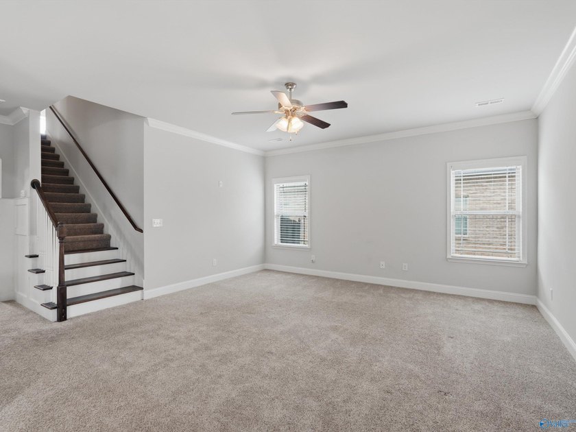 This home offers unbeatable convenience, just minutes from - photo 6