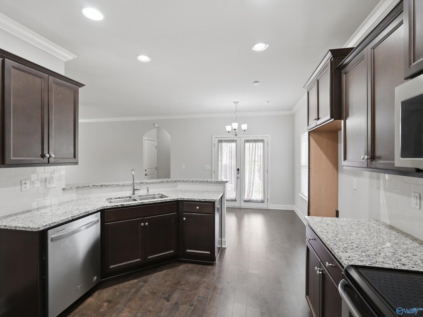This home offers unbeatable convenience, just minutes from - photo 7