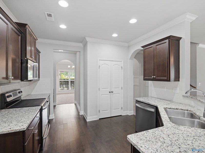 This home offers unbeatable convenience, just minutes from - photo 8