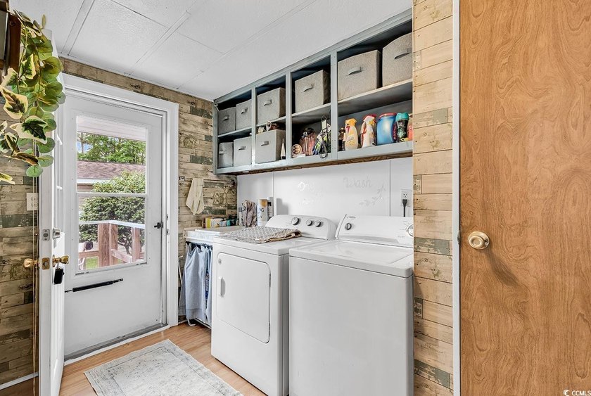 Coastal Charm Meets Recent Updates! This coastal retreat has - photo 25