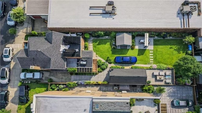Stunning detached two-family home situated in the highly - photo 11