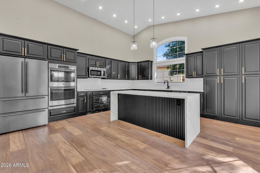 Welcome Home: Lakefront Luxury Awaits Step into a home where - photo 12