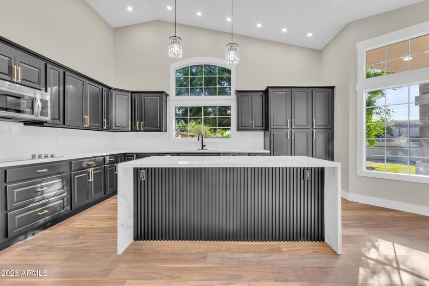 Welcome Home: Lakefront Luxury Awaits Step into a home where - photo 13