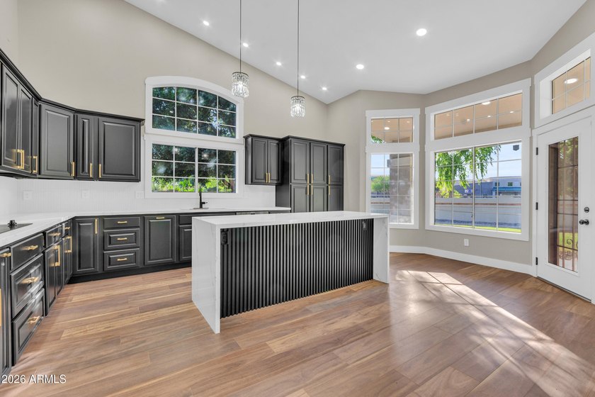 Welcome Home: Lakefront Luxury Awaits Step into a home where - photo 14