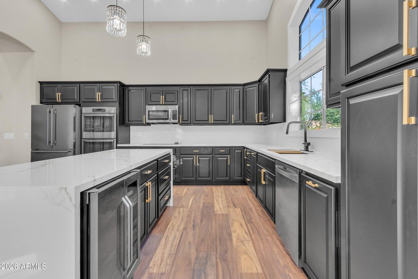 Welcome Home: Lakefront Luxury Awaits Step into a home where - photo 15