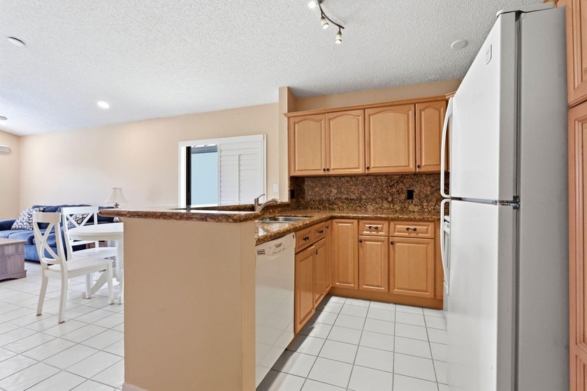 Welcome to this exceptional single-story waterfront residence - photo 11
