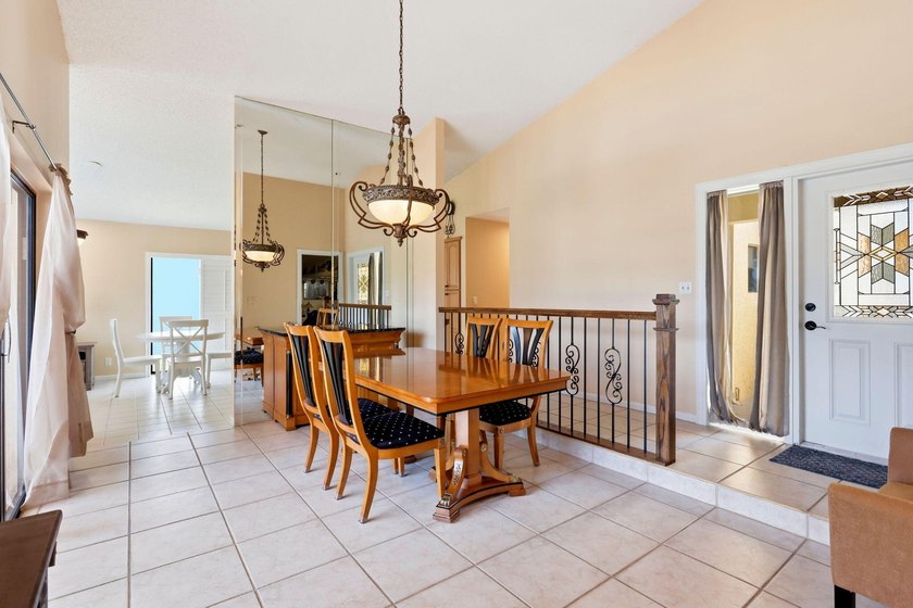 Welcome to this exceptional single-story waterfront residence - photo 14