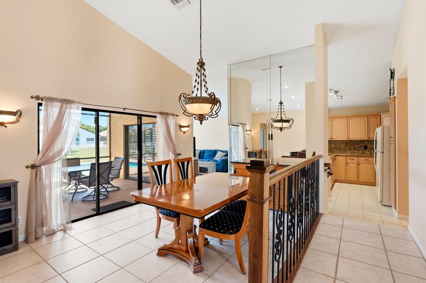 Welcome to this exceptional single-story waterfront residence - photo 15