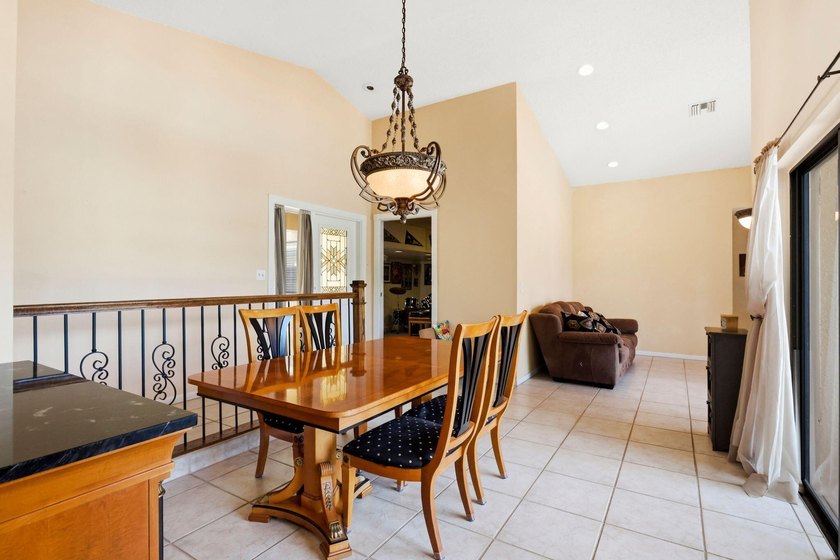 Welcome to this exceptional single-story waterfront residence - photo 16