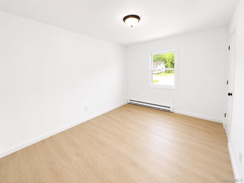 LIVING LUXURY In The Heart Of Bellport! This Ranch Style Home Is - photo 8