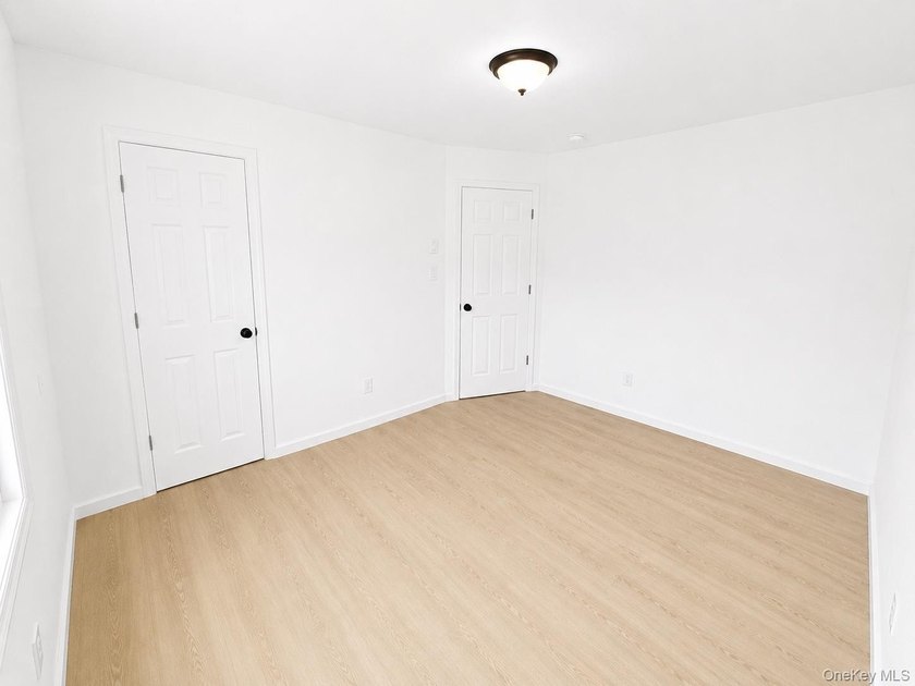 LIVING LUXURY In The Heart Of Bellport! This Ranch Style Home Is - photo 9