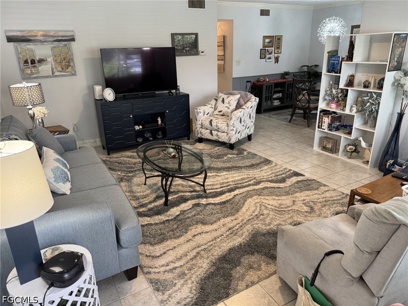 This is a wonderful 2 bedroom plus sunroom/den, 2 bath with - photo 2