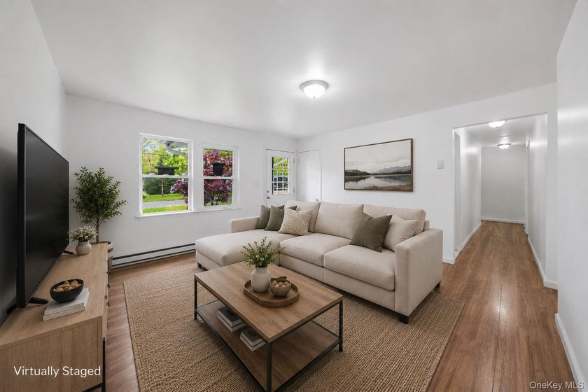 Nestled in the heart of Mastic Beach, 113 Huguenot Drive is the - photo 12