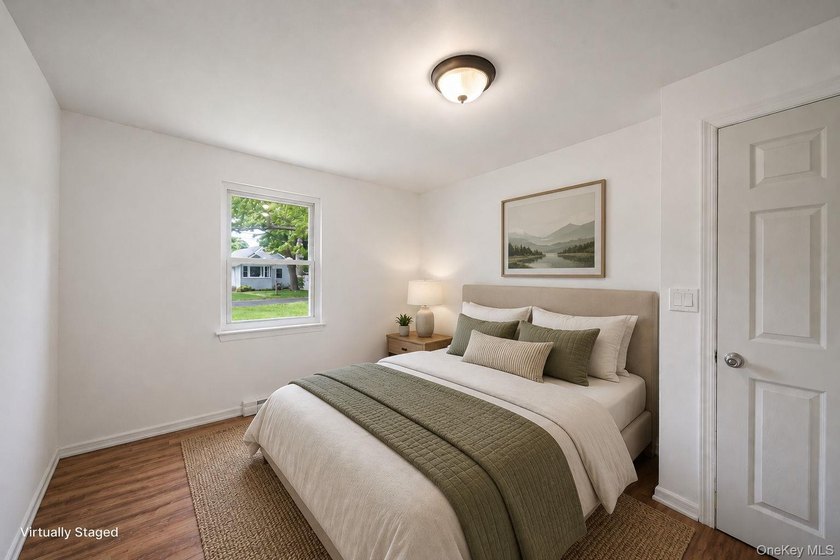 Nestled in the heart of Mastic Beach, 113 Huguenot Drive is the - photo 18