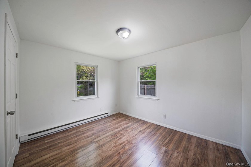Nestled in the heart of Mastic Beach, 113 Huguenot Drive is the - photo 20