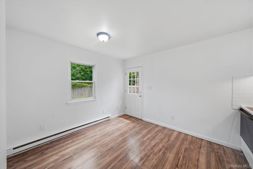 Nestled in the heart of Mastic Beach, 113 Huguenot Drive is the - photo 23