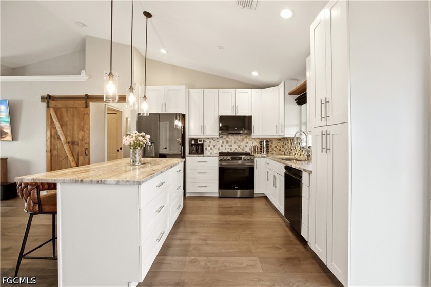 PRICE ADJUSTMENT! Welcome to this beautifully updated 3-bedroom - photo 6