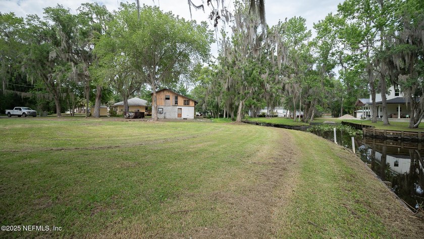 Tucked along a quiet canal just off the St. Johns River, this - photo 8